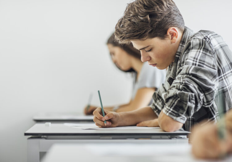Teenage boy doing an exam